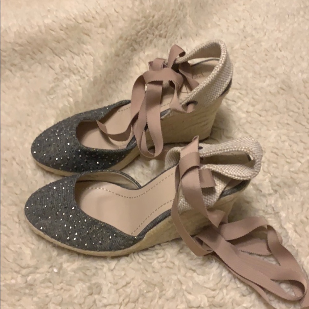 Wedge shoes with sparkle front and tie at ankle.